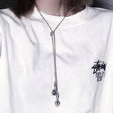 Collar de hilo fino con auriculares de plata